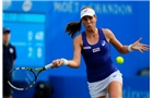 BIRMINGHAM, ENGLAND - JUNE 11: Johanna Konta of the United Kingdom in action against Aleksandra Wozniak of Canada during day three of the Aegon Classic at the Edgbaston Priory Club on June 11, 2014 in Birmingham, England. (Photo by Paul Thomas/Getty Images)